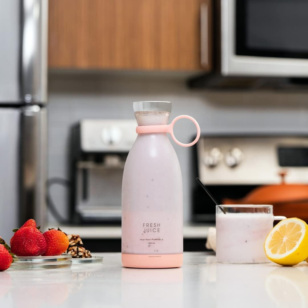 Portable blender making fresh juice, smoothie, milkshake and protein shake.