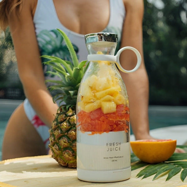 Portable blender making fresh juice, smoothie, milkshake and protein shake.